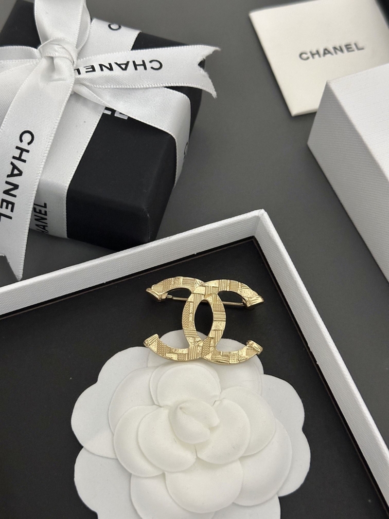 Ch**el brooches
